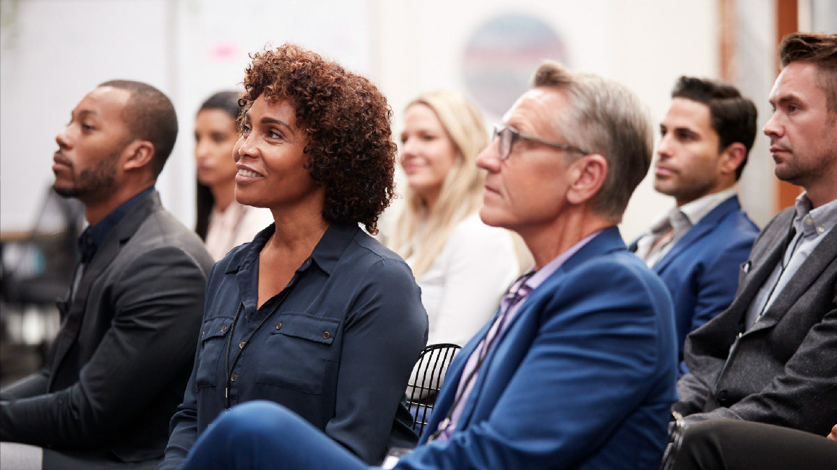 People at an event looking engaged